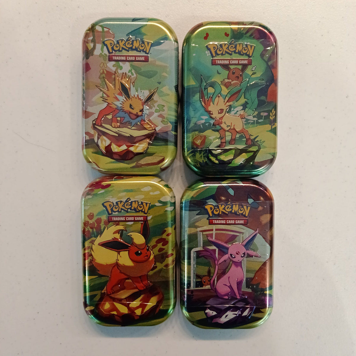 2023 Pokemon Mini Tin Collection Umbreon, Glaceon, Vaporeon, Sylveon, Jolteon, Leafeon, Fl - view 2