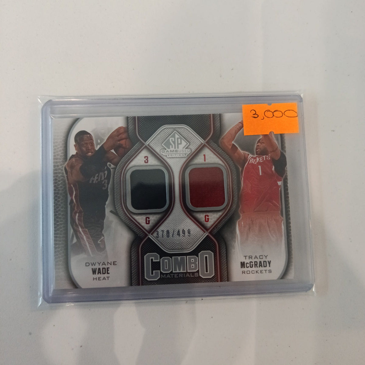 2009-10 Upper Deck SP Game Used Combo Materials Dwyane Wade / Tracy McGrady #CM-DT
